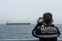 A French Navy personnel observes an oil tanker, subject to international sanctions and sailing from Russia, sailing in the Atlantic Ocean, in this handout obtained by Reuters on June 1, 2026. (Marine Nationale/Handout via Reuters) 