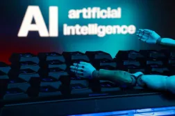 ‘Yapay zekâ’ ibaresi, bir klavye ve robot ellerinin yer aldığı bir illüstrasyon (Reuters)