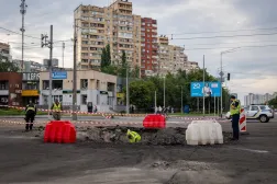 A sapper examines the impact site of a Russian missile in a residential area of Kyiv, Saturday, July 11, 2026. (AP) 