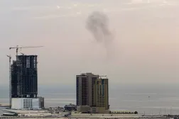 Smoke rises after a drone was intercepted during early morning hours in Manama, Bahrain, July 14, 2026. REUTERS/Stringer