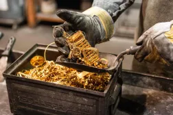 Gold jewelry being prepared before melting to produce gold bars at the Austrian gold and silver refinery 'Oegussa' in Vienna (AFP)