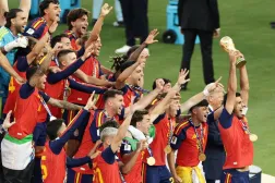  Spain's Rodri (16) lifts the trophy as Spain celebrates after winning the World Cup final match between Spain and Argentina in East Rutherford, NJ, near New York, Sunday, July 19, 2026. (AP) 