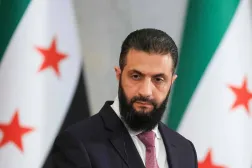 Syrian President Ahmed al-Sharaa looks on during a joint press conference with France's President in Damascus on July 7, 2026.  (Photo by Ludovic MARIN / POOL / AFP)