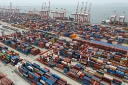 Shipping containers are seen ready for transport at the Guangzhou Port in the Nansha district in southern China's Guangdong province, April 17, 2025. (AP) 