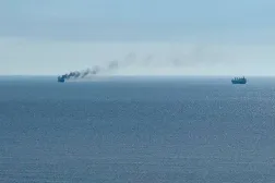 A civilian vessel is on fire, as Ukraine's navy spokesman reported a Russian military strike on a civilian vessel, amid Russia's attack on Ukraine, near the Black Sea port of Odesa, Ukraine, July 14, 2026. (Reuters)