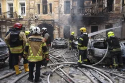Ukrainian rescuers work at the site of a Russian strike on a residential area in downtown Odesa, Ukraine, 09 August 2026, amid the Russian invasion. EPA/IGOR MASLOV