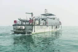 A vessel of the navy of Yemen's Aden-based internationally recognized government patrols a shipping lane off Hanish Island in the Red Sea on July 27, 2026. (Photo by Khaled ZIAD / AFP) / 