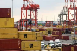 FILE PHOTO: Workers move shipping containers at the Port Authority of New York and New Jersey in, Newark, New Jersey, US, September 30, 2024. REUTERS/Caitlin Ochs/File Photo
