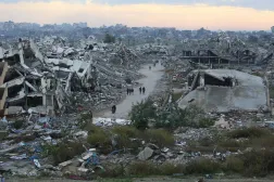 (FILES) A general view of destroyed houses in Nuseirat camp in the central Gaza Strip on December 19, 2025. (Photo by Eyad Baba / AFP)