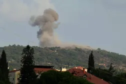 A photograph taken from the southern Lebanese area of Nabatieh shows smoke as it rises from the site of Israeli strikes that targeted the hilltops of the mountainous area of the strategic Ali al-Taher ridge on August 14, 2026. (Photo by AFP) 