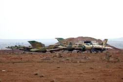 A picture taken on January 21, 2018 shows damaged Syrian air force fighter planes at the Abu Duhur military airport area in Syria's Idlib province. (File/AFP)