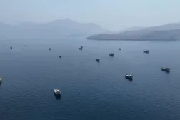 A drone view shows vessels near the Strait of Hormuz, as seen from Musandam, Oman, August 28, 2026. (Reuters)