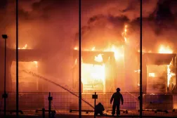  Firefighters work at the site of a warehouse hit by a Russian drone strike, amid Russia's attack on Ukraine, in Kyiv region, Ukraine, September 4, 2026. (Reuters)