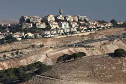 This photograph taken from the E1 corridor, an area in the occupied West Bank shows vehicles driving along the highway near the Israeli settlement of Maale Adumim, on September 8, 2026. (AFP)