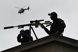 Snipers of the police stand on a roof to protect the area around the Neue Wache (New Watchhouse) Central Memorial of the Federal Republic of Germany to the Victims of War and Tyranny in Berlin, Germany, where the German President and his counterpart from the United Arab Emirates are expected to lay a wreath, on September 10, 2026. (AFP)  