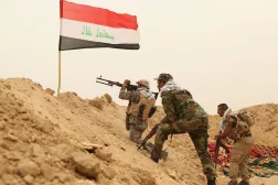 Fighters from the Badr Brigades clash with the ISIS group at the front line on the outskirts of Fallujah in the Anbar province of Iraq, June 1, 2015. (AP)