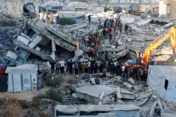  People gather as Civil Defense workers attempt to rescue those who are trapped beneath the rubble of a residential building that had been damaged in an earlier Israeli strike during the war and collapsed on Wednesday, in Gaza City, September 16, 2026. (Reuters)
