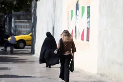 Iranian women walk in a street on the fourth anniversary of protests following Mahsa Amini's death in downtown Tehran, Iran, 16 September 2026. (EPA)