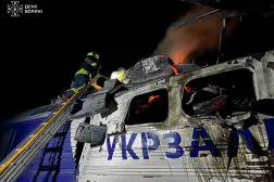 A handout picture taken and released by Ukrainian State Emergency Service on September 15, 2026 shows firefighters extinguishing a fire in a train locomotive after it was targeted by a Russian drone in the Volyn region, amid the Russian invasion of Ukraine. (Photo by Handout / Ukrainian State Emergency Service / AFP)