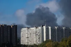 Smoke rises behind a multi-story building following a reported Ukrainian drone attack in Dzerzhinsky, Moscow region, Russia, 20 September 2026. EPA/STRINGER