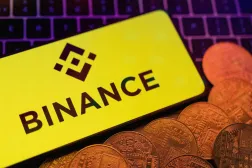 FILE PHOTO: Smartphone with displayed Binance logo and representation of cryptocurrencies are placed on a keyboard in this illustration taken, June 8, 2023. REUTERS/Dado Ruvic/Illustration/File Photo