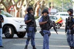 South African police officers during a raid in Johannesburg (Archive - Reuters)