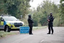 28 September 2026, United Kingdom, Fairford: A police checkpoint near RAF Fairford after major incident was declared on Sunday, with armed police manning a cordon near the village of Whelford in Gloucestershire, near RAF Fairford which is used by the United States Air Force (USAF). Photo: Ben Birchall/PA Wire/dpa