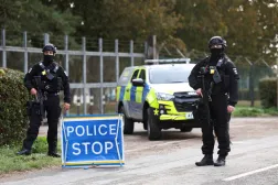 FILE PHOTO: Armed police officers stand guard on a road outside the perimeter of the RAF Fairford airbase, in Fairford, Gloucestershire, Britain, September 28, 2026. REUTERS/Toby Shepheard/File Photo