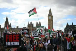People cross Westminster Bridge as they take part in a National March in support of Palestine, organised by Palestine Solidarity Campaign, in central London on October 10, 2026. (Photo by JUSTIN TALLIS / AFP)