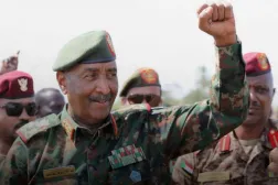 Sudan's army chief Abdel Fattah al-Burhan gestures to soldiers inside the presidential palace after the Sudanese army said it had taken control of the building, in the capital Khartoum, Sudan March 26, 2025. Sudan Transitional Sovereignty Council/Handout via REUTERS