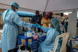 Health workers and humanitarian responders on the front lines of the Ebola response gather to receive a vaccination due to their potential exposure to the virus as part of their work with suspected cases, including contacts, as aid agencies intensify efforts to contain the Ebola outbreak involving the Bundibugyo strain, in the North Kivu Province of the Democratic Republic of the Congo, October 16, 2026. (Reuters)