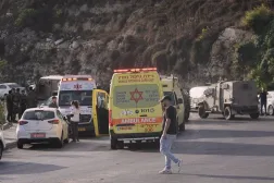  Israeli soldiers and emergency personnel gather near ambulances following a shooting attack near Yehuda Junction, near Hebron, in the occupied West Bank, Friday, Oct. 23, 2026. (AP) 