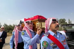 جانب من تشييع ضحايا الكنيسة الأحد (مديرية الأمن العام بالأردن)