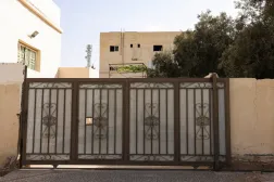 A building shows signs of gunfire at the site where Jordanian security forces arrested three suspects in connection with the deadly church shooting, in the Al-Judayyda area of Karak, Jordan, October 26, 2026. REUTERS/Alaa Al Sukhni