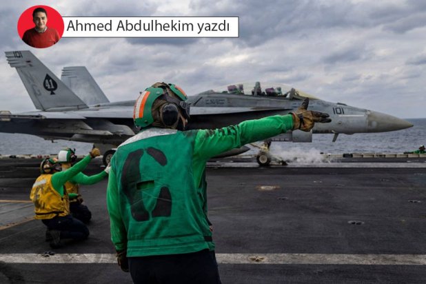 ABD Başkanı Donald Trump, böyle bir saldırı başlatma konusunda henüz nihai kararını vermedi, ancak bir anlaşmaya varmak için diplomasi kapısının halen açık olduğunu ima etti (AFP)