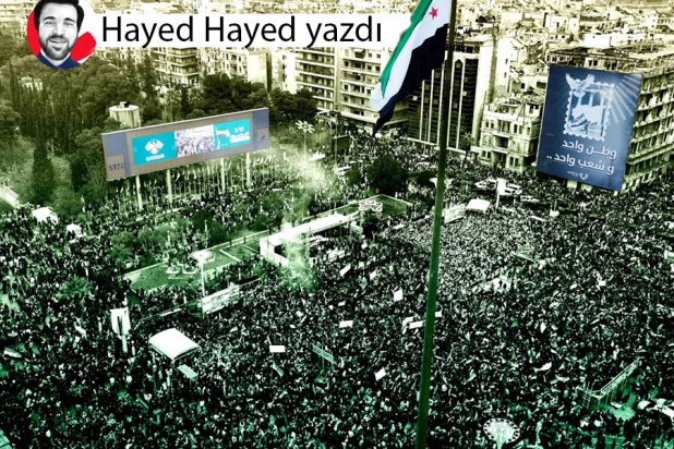 Beşşar Esed'in devrilişinin birinci yıldönümünü anmak için bir araya gelen Suriyeliler(Reuters)