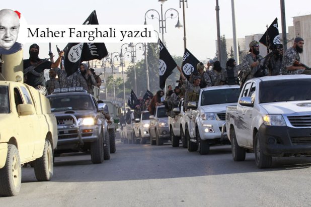 Fotoğraf: Suriye'nin kuzeyindeki Rakka şehrinin sokaklarında askeri araçlarda DEAŞ militanları, 30 Haziran 2014 (Reuters)