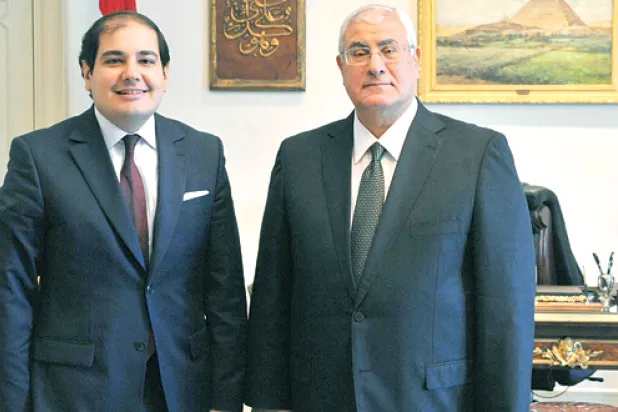 الرئيس المصري عدلي منصور والدكتور عادل الطريفي رئيس تحرير {الشرق الأوسط}