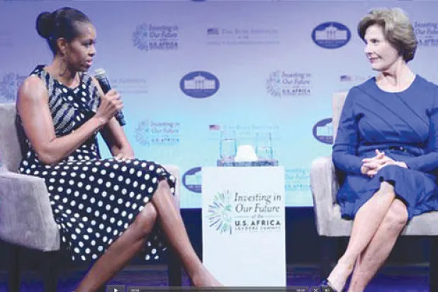 ميشيل أوباما ولورا بوش.. حكايات مشتركة في دائرة الضوء