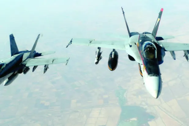 واشنطن وطهران.. بين الموقف الموحد في ضرب «داعش» وتجنب الظهور كحليفين