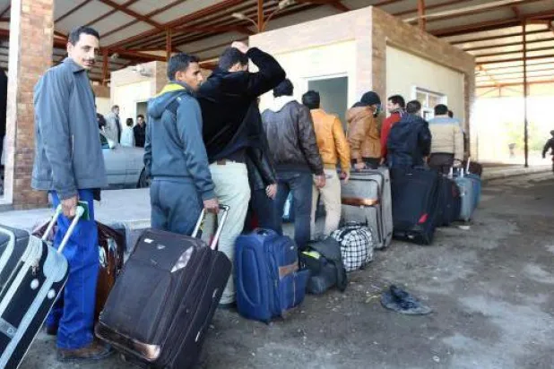 مصريون عادوا من ليبيا بعد الاستغاثة من الرمضاء بالنار
