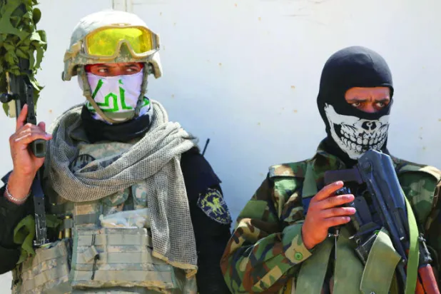 طهران تهيمن على الحياة السياسية والعسكرية في بغداد