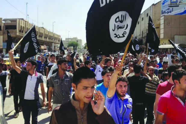 {داعش} ينتزع المال من محكوميه