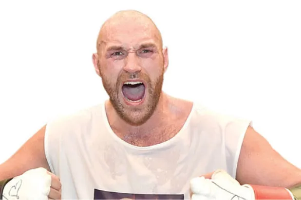 الملاكم تايسون فيوري.. في نزال مع العالم