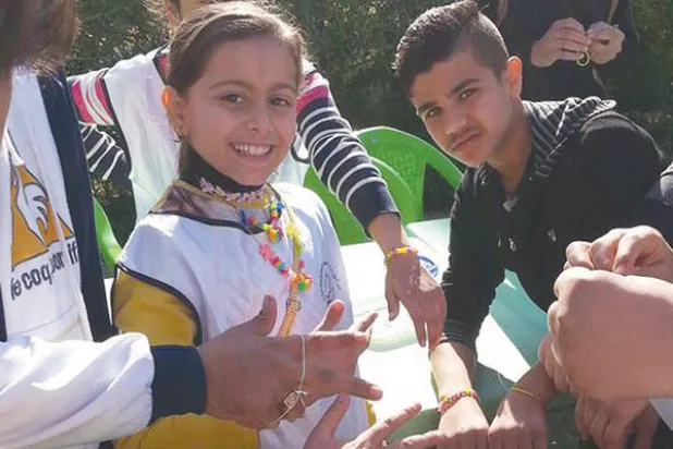 أطفال عراقيون يشاركون في أول مخيم كشفي في بابل الأثرية