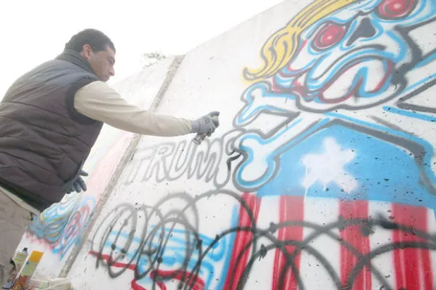 ترمب يتهم إيران بابتلاع العراق