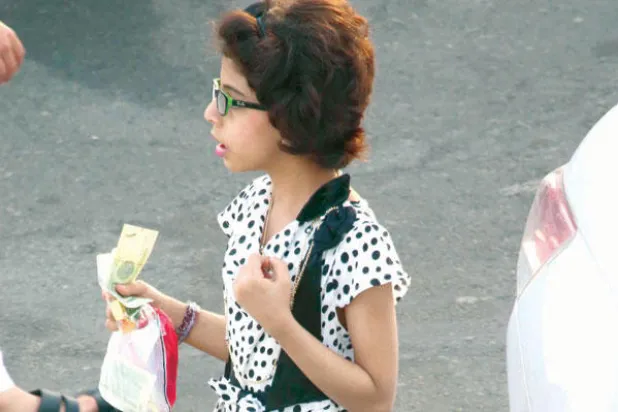 الأوراق النقدية الجديدة أحد ملامح العيد لدى السعوديين