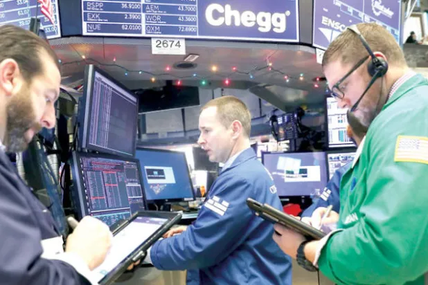 بورصات العالم تتطلع لاستمرار انتعاش الأسهم في العام الجديد