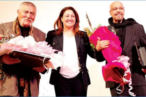 خلال حفل تكريمه العام الماضي مع وزيرة الثقافة السابقة سنية مبارك