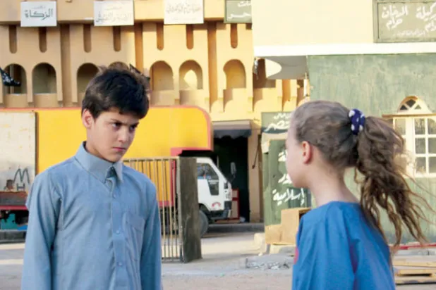 طفلان يشاركان في العمل («الشرق الأوسط»)